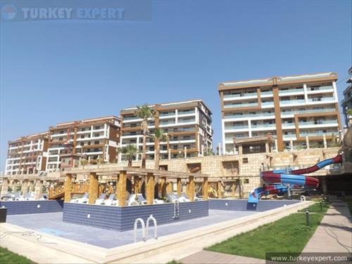 Hoogwaardige nieuwe ontwikkeling met uitstekend uitzicht over zee en de parken van het Kusadasi stadscentrum