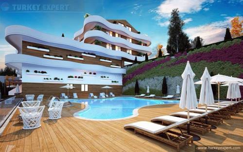Nog maar enkele appartementen te koop in een nieuw project in Ladies Beach Kusadasi (bijgewerkte foto's)