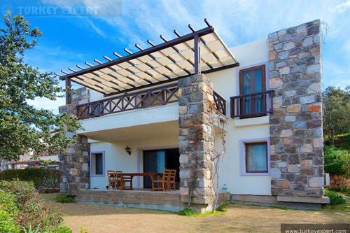 Detached holiday home for sale in Bodrum Gumusluk with beautiful sea and sunset views