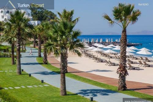 Duplex villa for sale in Bodrum on a prestigious beachfront complex in Turgutreis