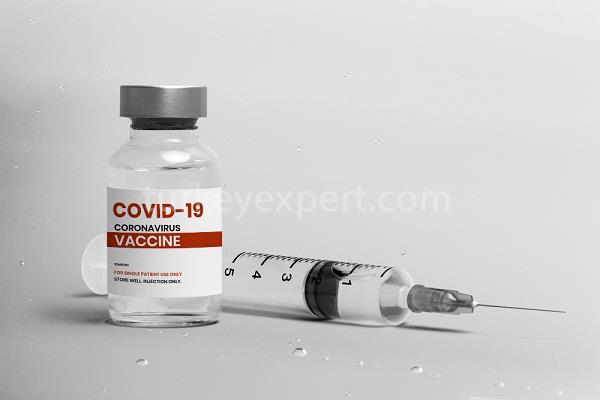 covid 19 vaccine injection glass bottle with syringe