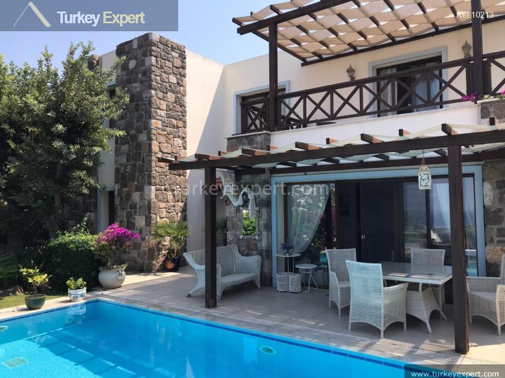 villa in bodrum gumusluk with a private pool and panoramic3