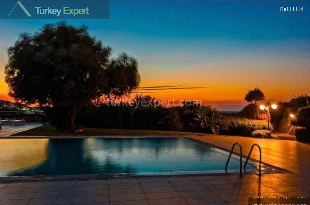 Apartment for sale in Bodrum Gumusluk with spectacular sea and sunset views 1