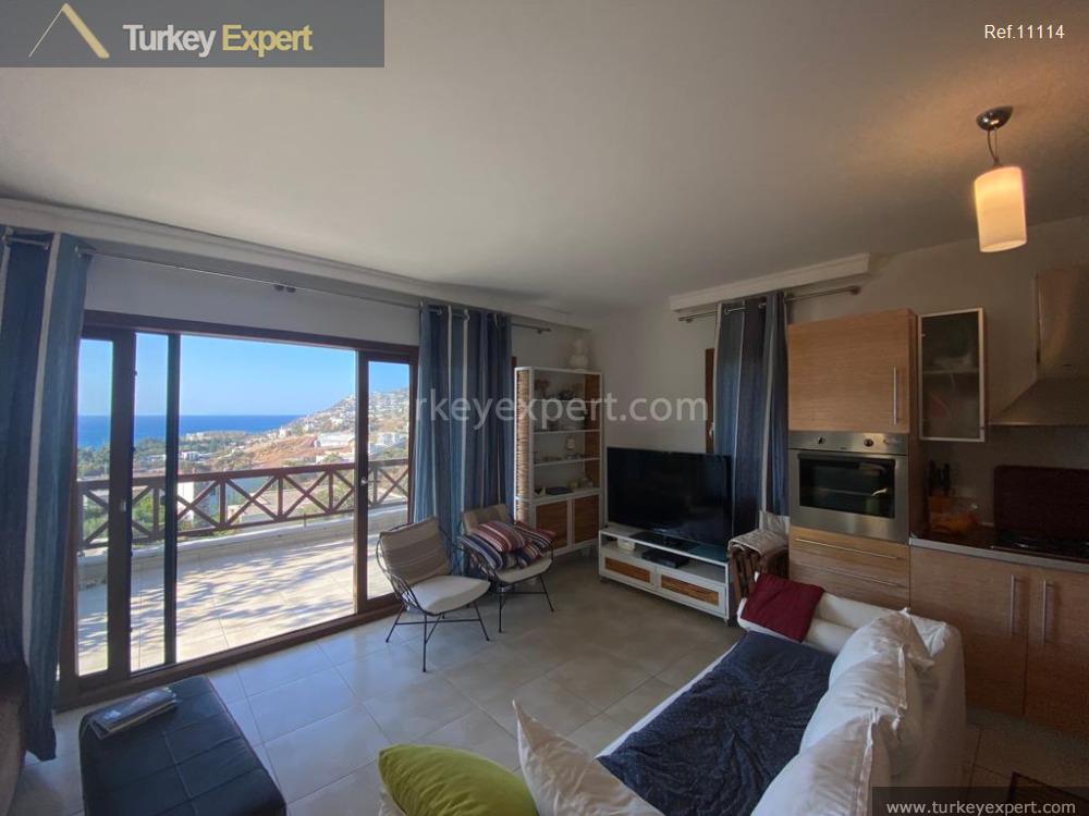 Apartment for sale in Bodrum Gumusluk with spectacular sea and sunset views 2