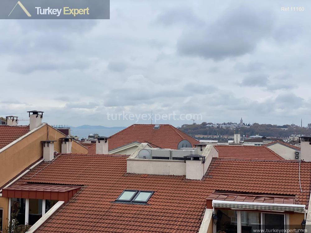 Spacious 4-bedroom apartment for sale in Istanbul Beyoglu with a rooftop terrace 2