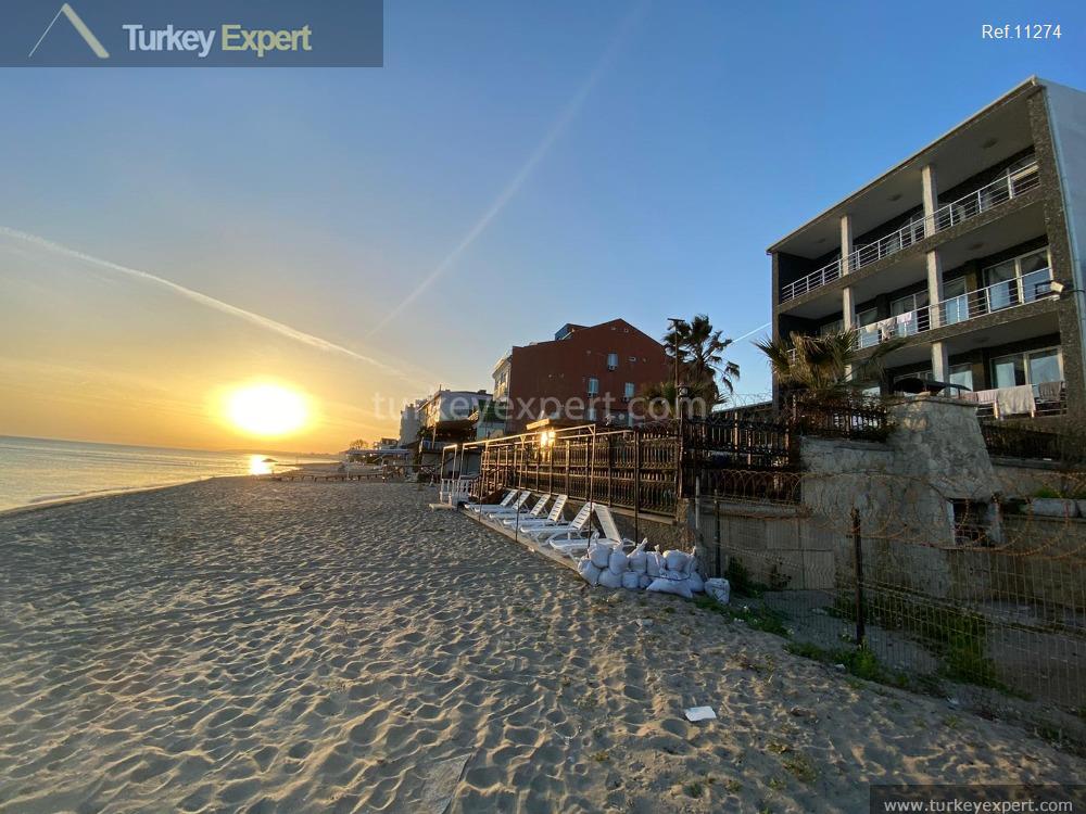 A complete building for sale right on the beach in Istanbul containing 8 apartments, 2 shops 0