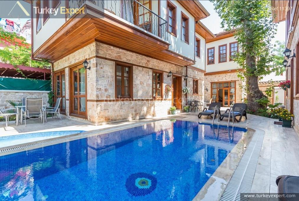 Homes for sale in Antalya center with pool, beautiful architecture, and near the promenade 0
