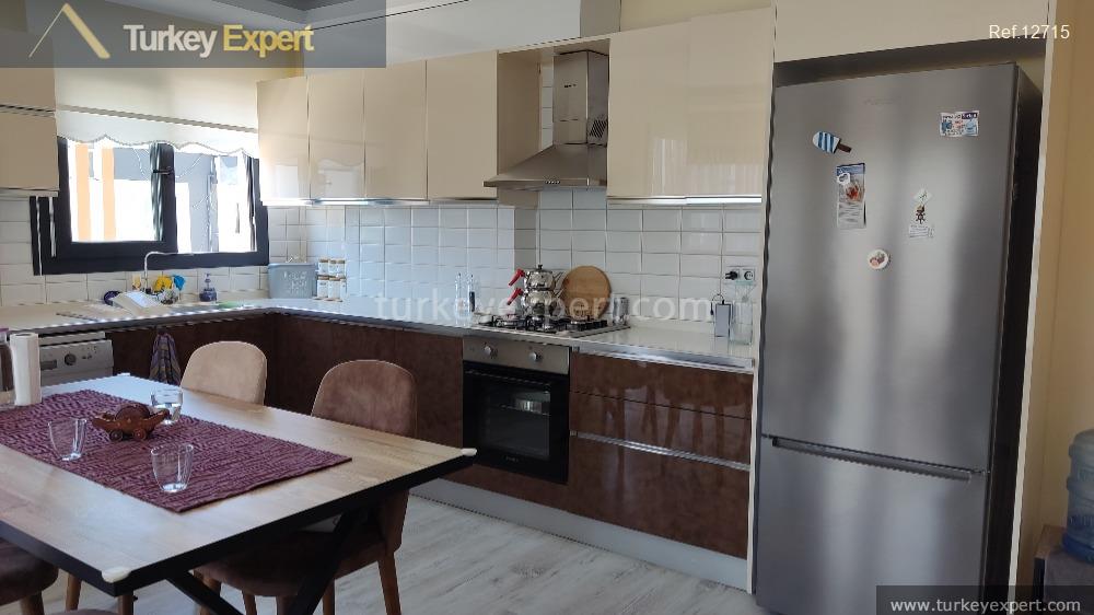 4-bedroom penthouse apartment with pool and partial sea view in Kusadasi Davutlar 0