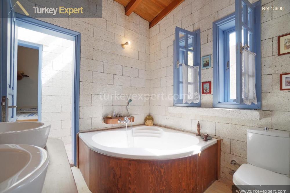 enchanting stone house for sale in izmir designed with italian20