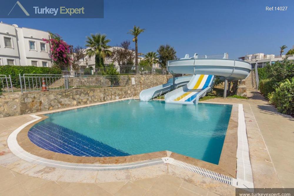 Stilvolle Gartenwohnung mit Meerblick in einem exklusiven Resort in Bodrum Yalikavak 1