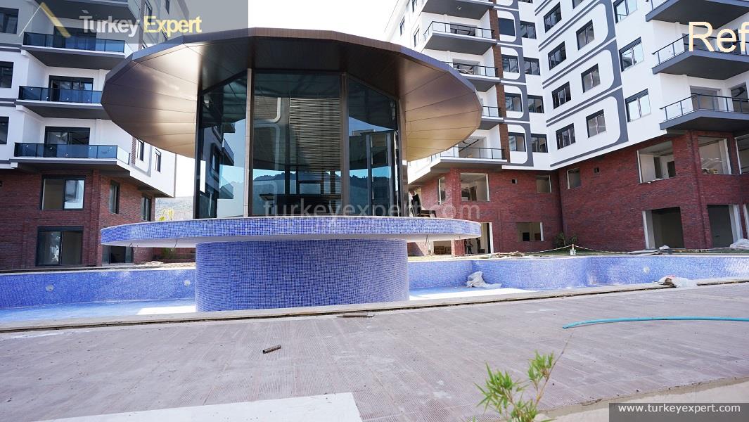 Duplex apartments with private gardens for sale in Antalya 0