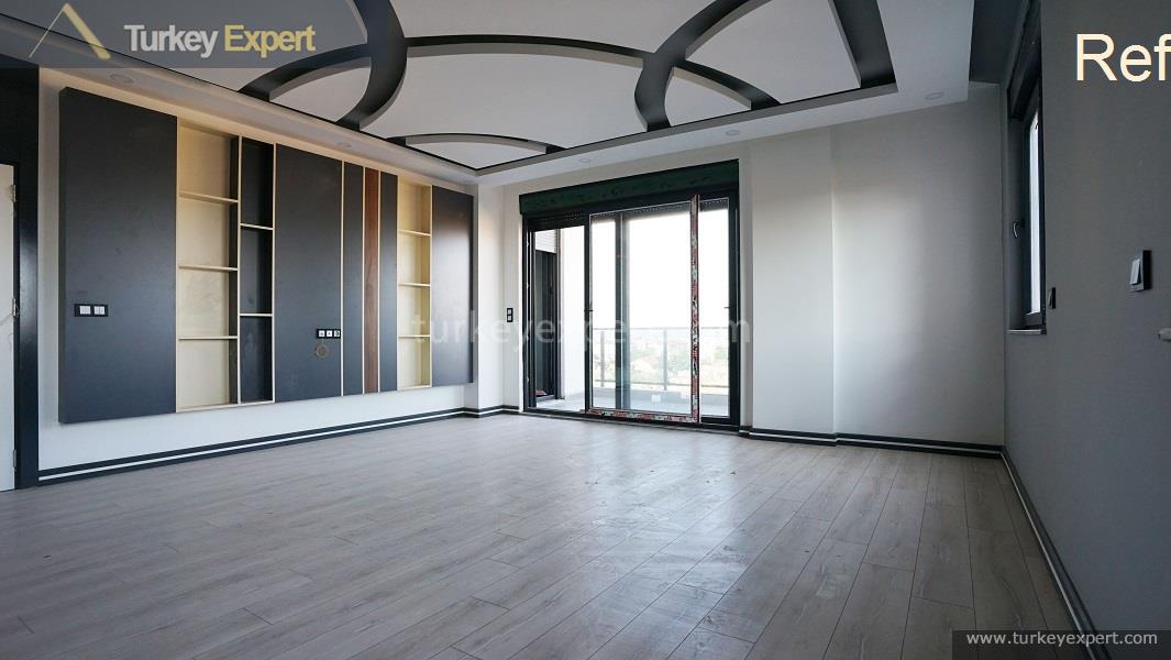 Duplex apartments with private gardens for sale in Antalya 1