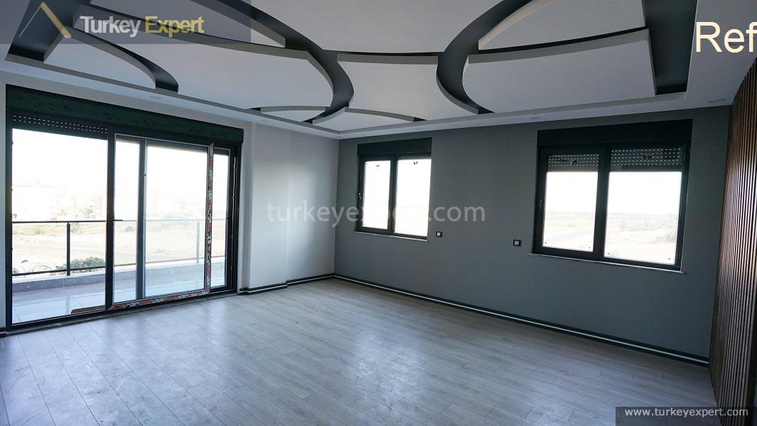 Duplex apartments with private gardens for sale in Antalya 2