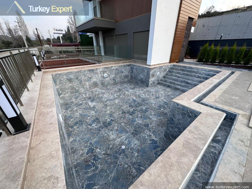 Lassen Sie sich Ihre private Villa mit Pool und Garage in Kusadasi nach Ihrem Geschmack zum Festpreis bauen. 0