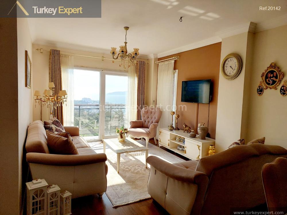 Sea-view apartment for sale in Bodrum Gulluk intertwined with nature 1