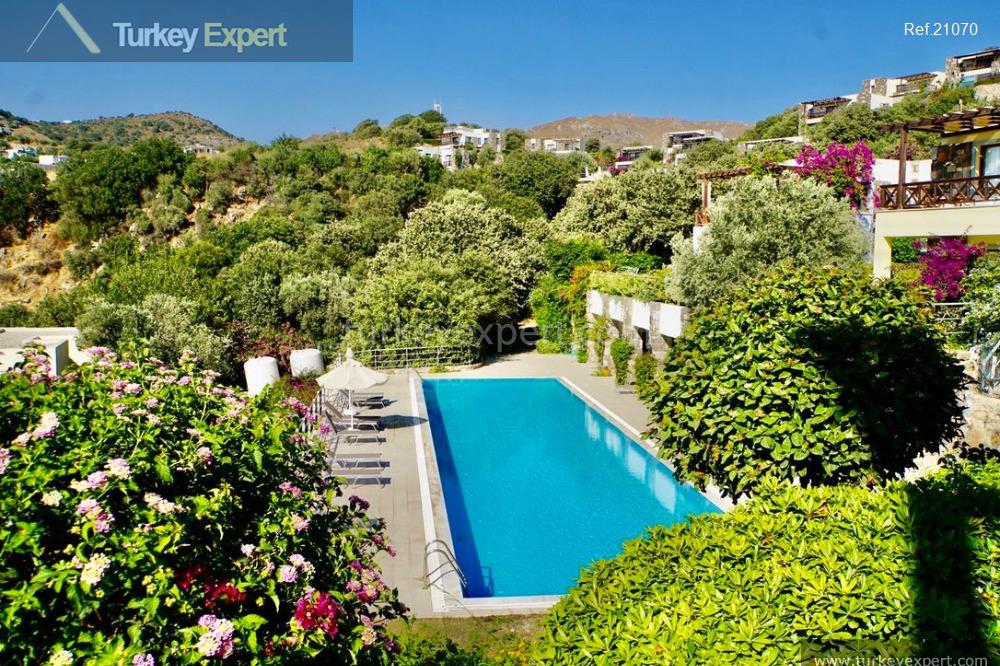 Meerblick-Immobilie in Bodrum, Gumusluk mit 100 m² Garten 1
